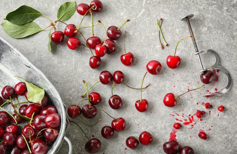 Cherries are red, small and fleshy fruits containing a hard seed inside.