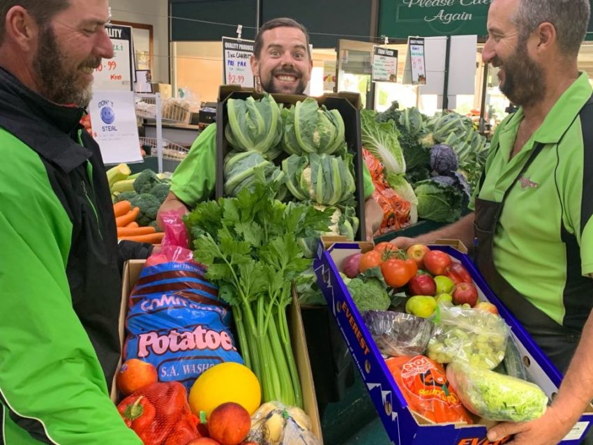 Staff with fresh produce